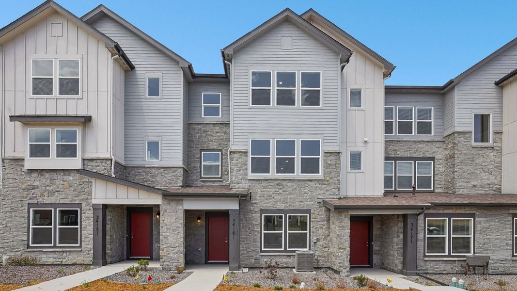 Front exterior of a new home in Windler Townhomes, Aurora, CO, highlighting curb appeal (Image 21).
