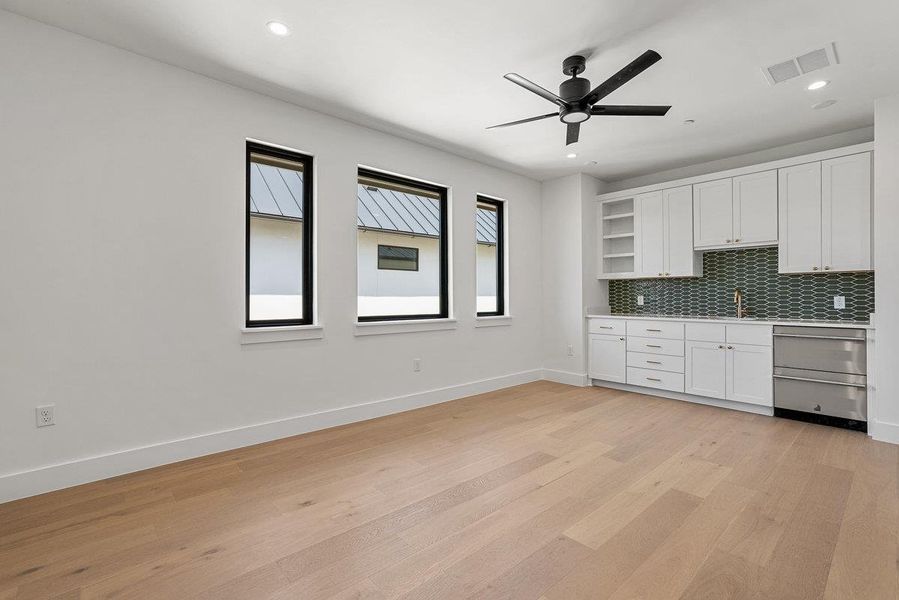 Spacious, unfurnished interior of a new home in Milky Way at River Place, Austin (Image 21).