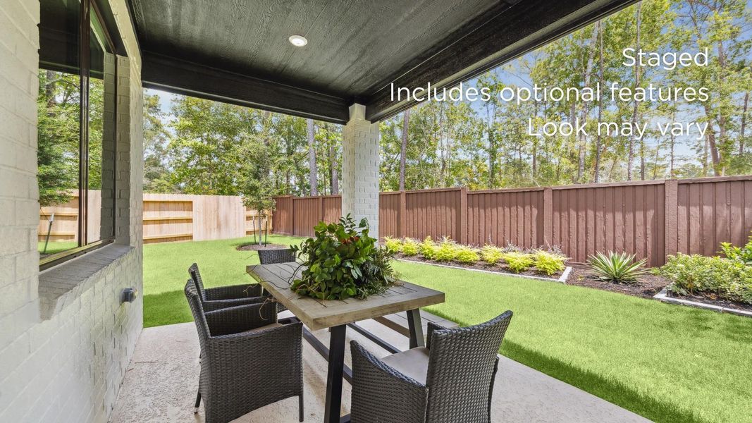 Exterior details and patio area of a home in , Magnolia (Image 2). Exterior details and patio area of a home in , Magnolia (Image 2).