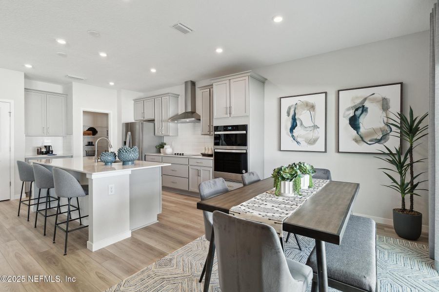 Furnished interior view inside a new home in Magnolia Series at Seminole Palms, Palm Coast (Image 7).