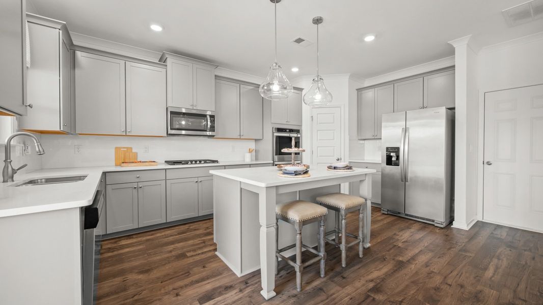 Representative furnished interior of a home built from the Savannah by D.R. Horton in Water Oak Estates, Lawrenceville (Image 12).