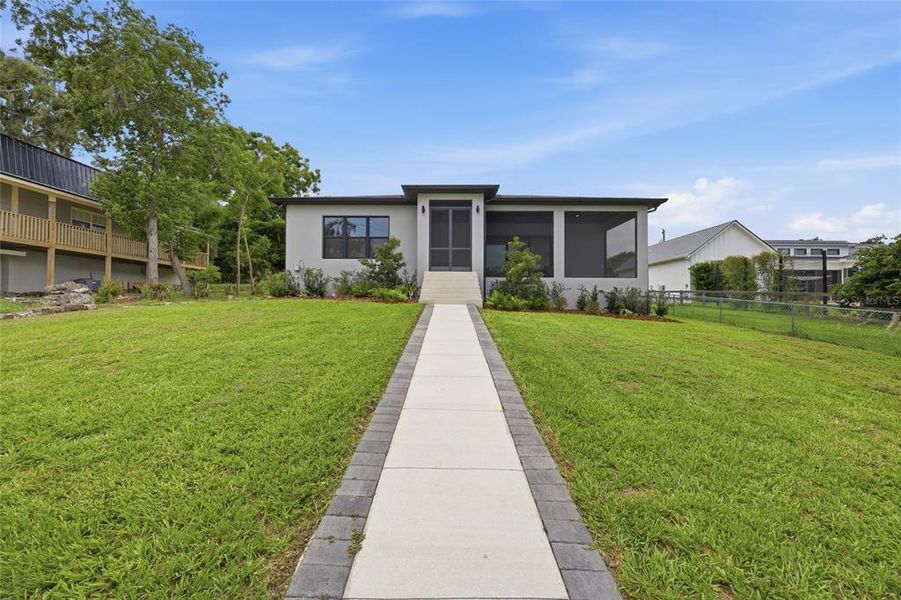 Front exterior of a new home in , Montverde, FL, highlighting curb appeal (Image 19). Front exterior of a new home in , Montverde, FL, highlighting curb appeal (Image 19).