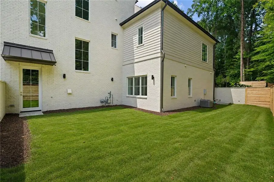 Exterior details and patio area of a home in , Atlanta (Image 31).
