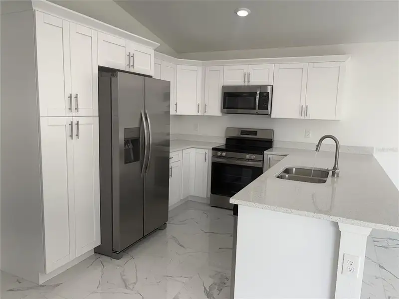 Furnished interior view inside a new home in , Cape Coral (Image 3).