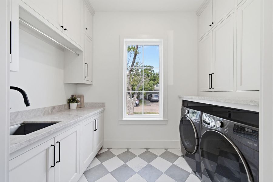 2 laundry rooms in this home. This is the room next to the garage. 2 laundry rooms in this home. This is the room next to the garage.