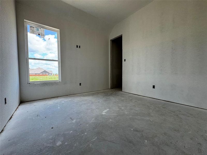 In-progress construction of a new home in Coyote Crossing, Godley, TX (Image 9).