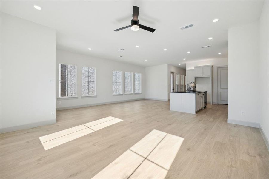 The entire family will love this spacious, light filled family-dining-kitchen area!