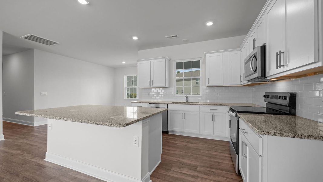 Furnished interior view inside a new home in Tyler - Home on the Lake, New Bern (Image 5).