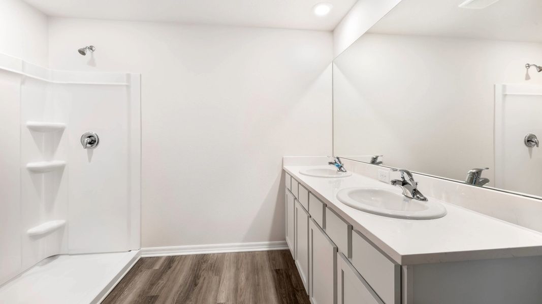 Representative furnished interior of a home built from the Aria by D.R. Horton in Oakfield Lakes, Parrish (Image 15).