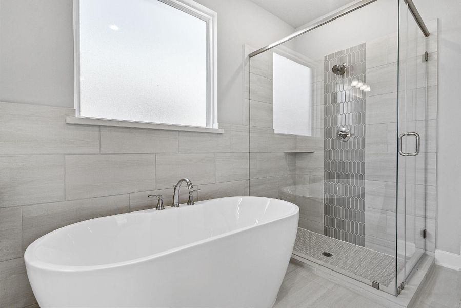 Furnished interior view inside a new home in Sunterra, Katy (Image 24).