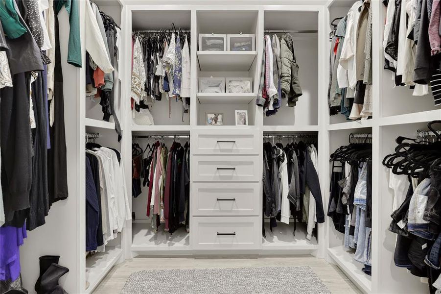 Get organized with this custom built walk in closet!