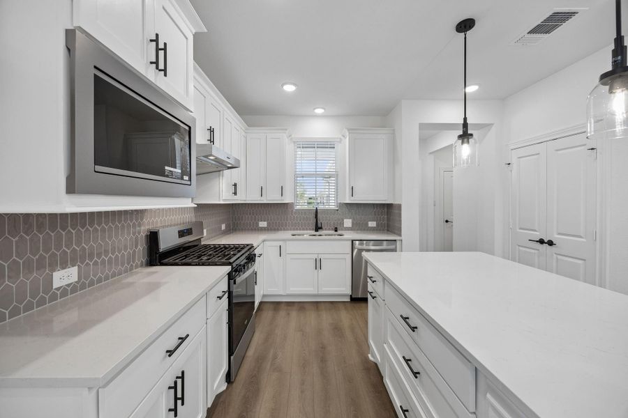 Furnished interior view inside a new home in Del Webb in Chambers Creek, Willis (Image 12).