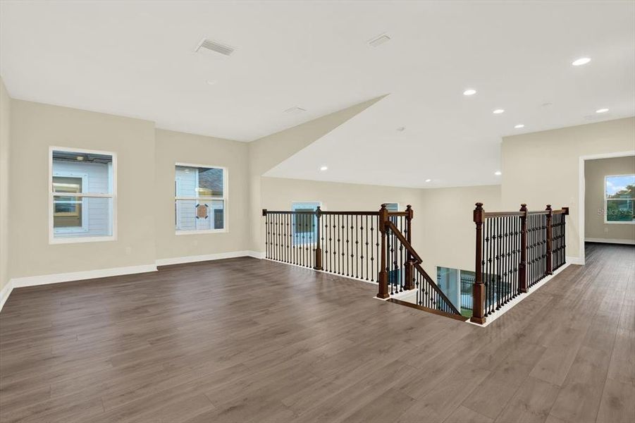Spacious, unfurnished interior of a new home in The Towns At Long Bayou, Seminole (Image 27).