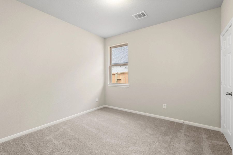 Spacious, unfurnished interior of a new home in Spring Creek Trails, Magnolia (Image 13).