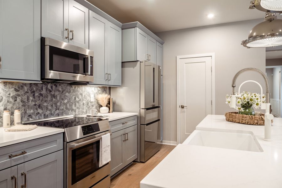 Representative furnished interior of a home built from the Linden by Fischer Homes in Twin Lakes, Hoschton (Image 11).