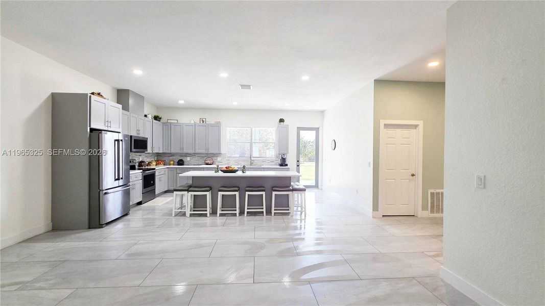 Furnished interior view inside a new home in , Clewiston (Image 11).