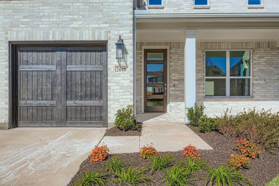 Exterior details and patio area of a home in Star Trail - 55s, Prosper (Image 3).
