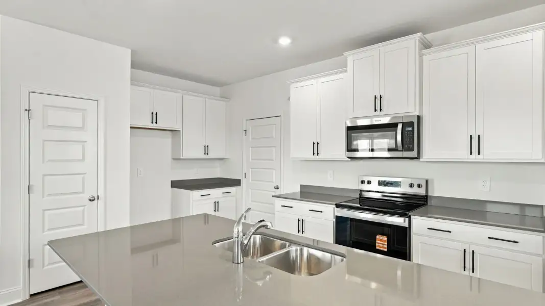 Furnished interior view inside a new home in The Lakes at North Glynn, Brunswick (Image 6).