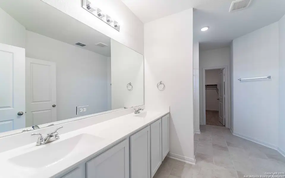 Furnished interior view inside a new home in Hunter's Ranch, San Antonio (Image 6).