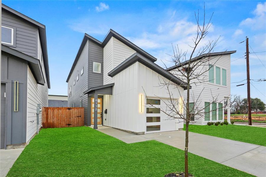 Front exterior of a new home in , Dallas, TX, highlighting curb appeal (Image 17).