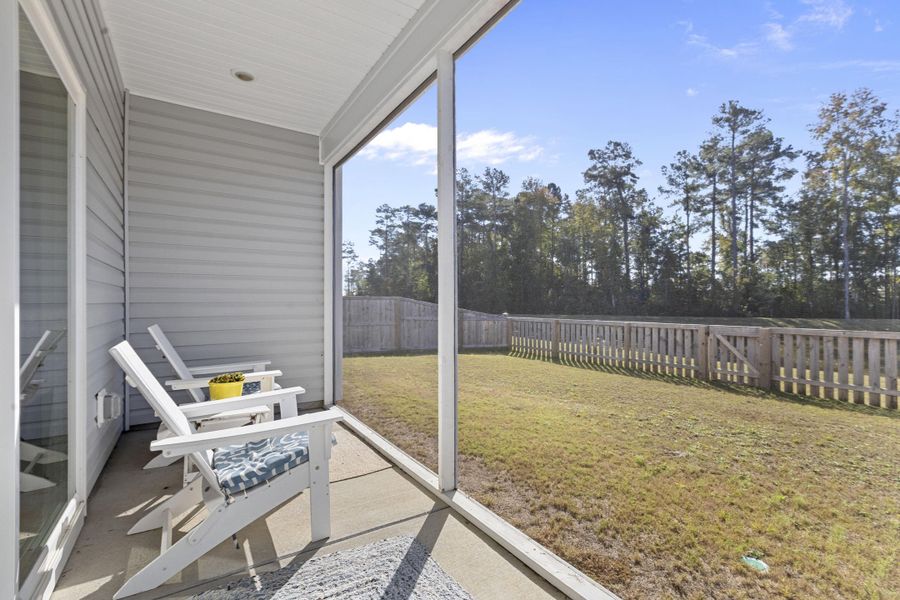 Exterior details and patio area of a home in K. Hovnanian's® Four Seasons at Lakes of Cane Bay, Summerville (Image 3). Exterior details and patio area of a home in K. Hovnanian's® Four Seasons at Lakes of Cane Bay, Summerville (Image 3).