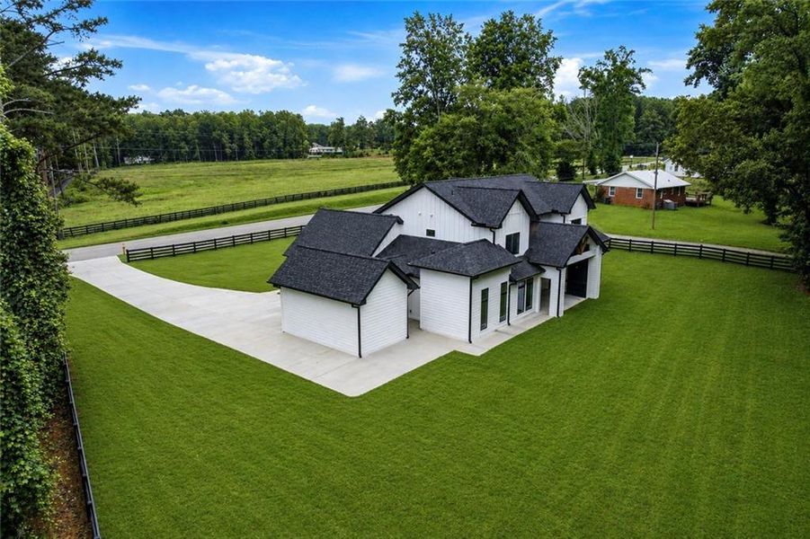 Front exterior of a new home in , Cumming, GA, highlighting curb appeal (Image 26).