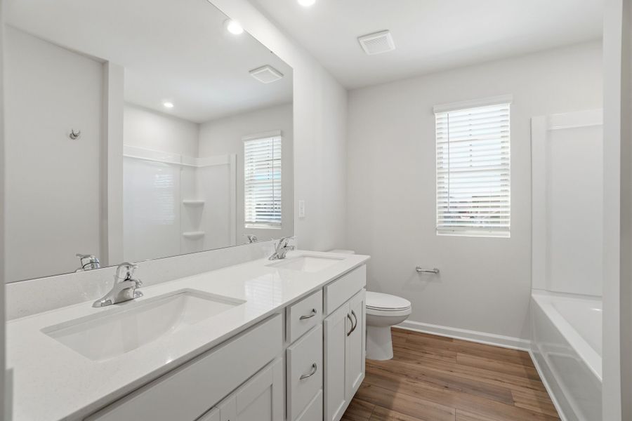 Furnished interior view inside a new home in Waxhaw Landing, Monroe (Image 11).