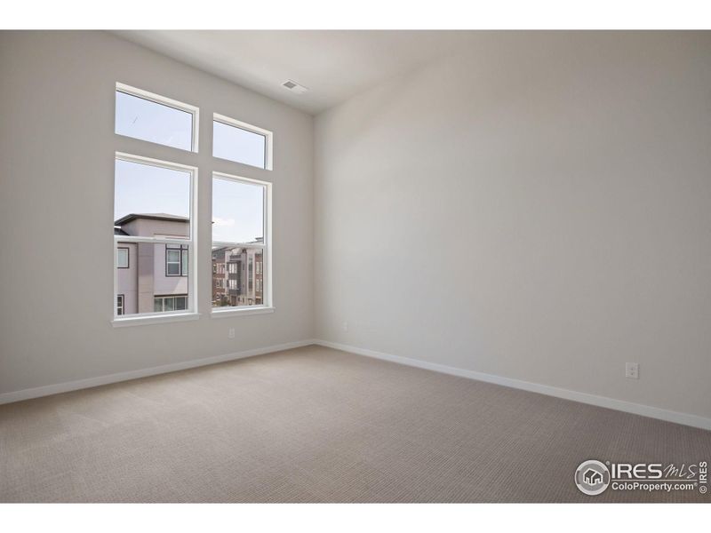 Primary Bedroom w/ 12 Foot Ceiling