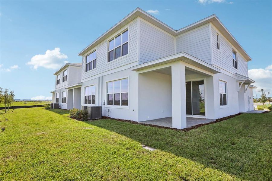 Front exterior of a new home in Isla Mirada, San Antonio, FL, highlighting curb appeal (Image 26).