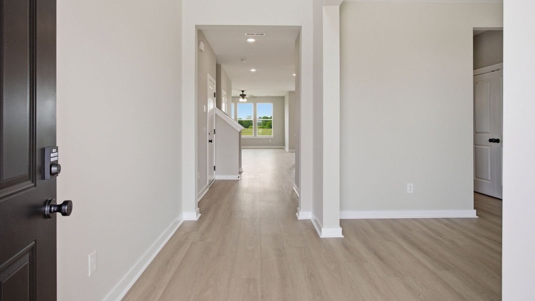 Front entryway to home with hard surface flooring Front entryway to home with hard surface flooring