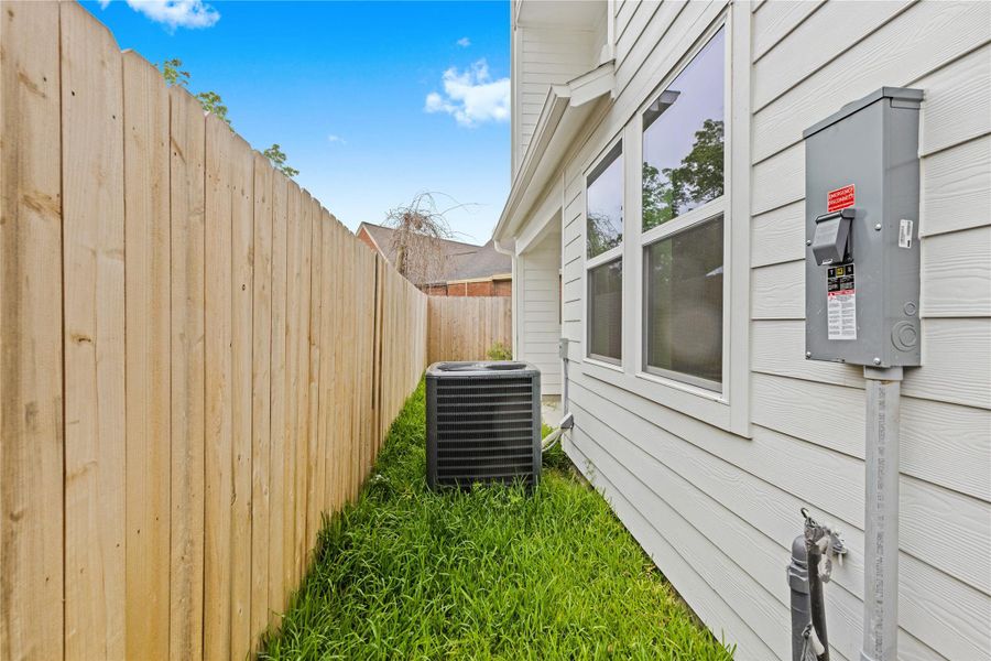 Exterior details and patio area of a home in , Houston (Image 15). Exterior details and patio area of a home in , Houston (Image 15).