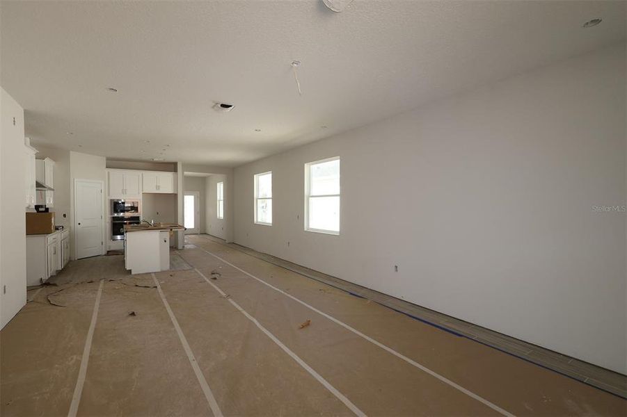 In-progress construction of a new home in Emerson Pointe, Apopka, FL (Image 26).