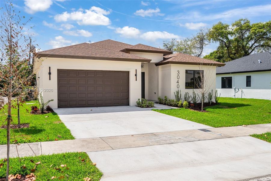 Front exterior of a new home in , Fort Lauderdale, FL, highlighting curb appeal (Image 20).