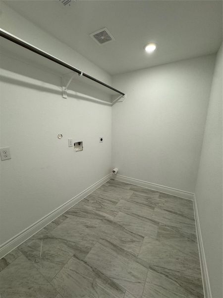 over sized utility room. enough room for freezer if needed