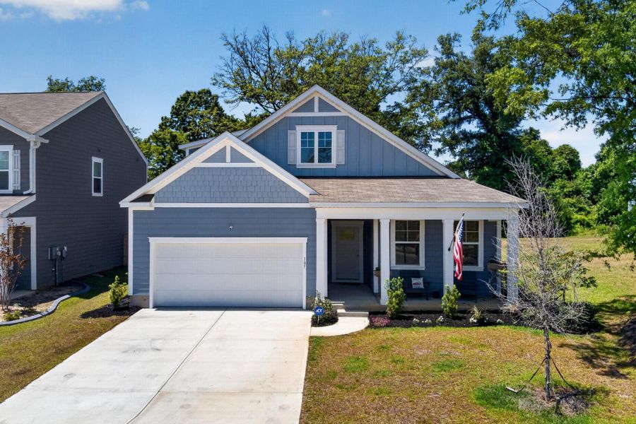 Front exterior of a new home in , Moncks Corner, SC, highlighting curb appeal (Image 1). Front exterior of a new home in , Moncks Corner, SC, highlighting curb appeal (Image 1).