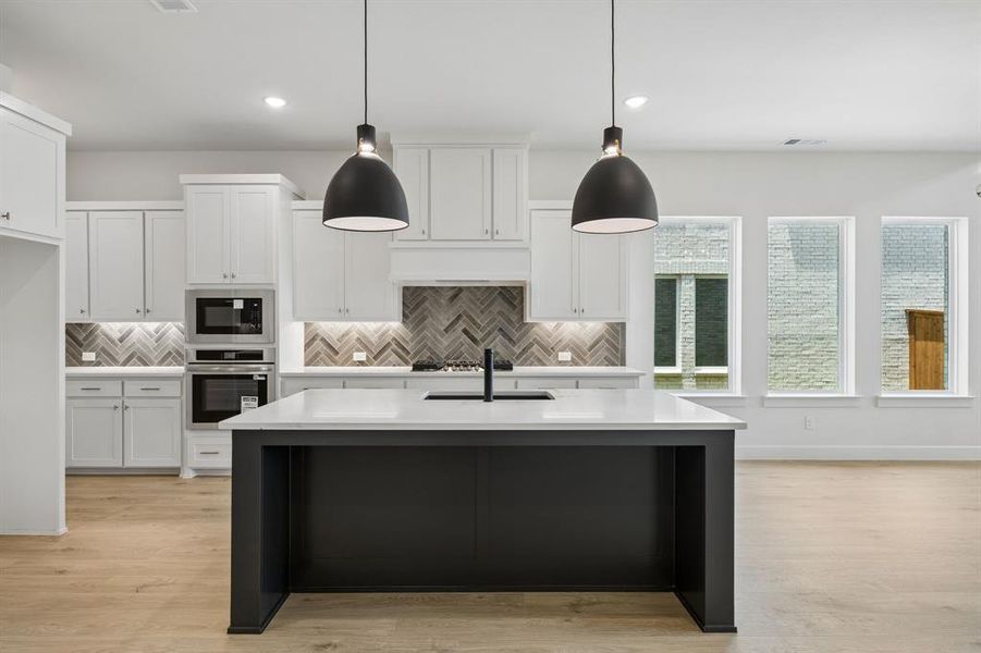 You'll find outstanding storage and prep space in this fantastic kitchen!