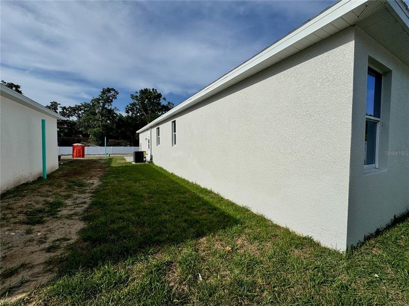 Exterior details and patio area of a home in , Dade City (Image 29).
