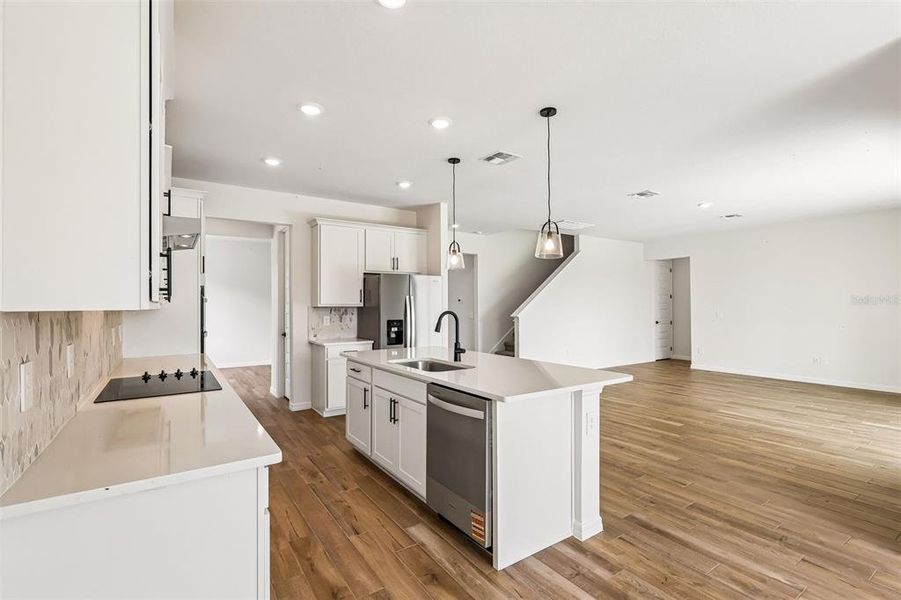 Furnished interior view inside a new home in The Grove at Stuart Crossing - Signature Series, Bartow (Image 12).