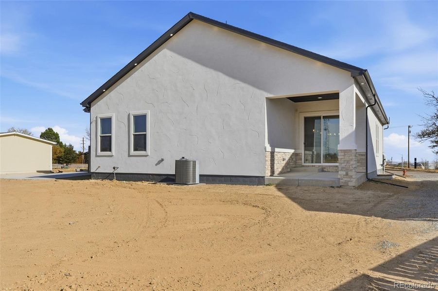Exterior details and patio area of a home in , Keenesburg (Image 29).