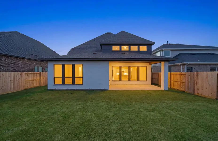 Exterior details and patio area of a home in The Highlands 55′, Porter (Image 27).