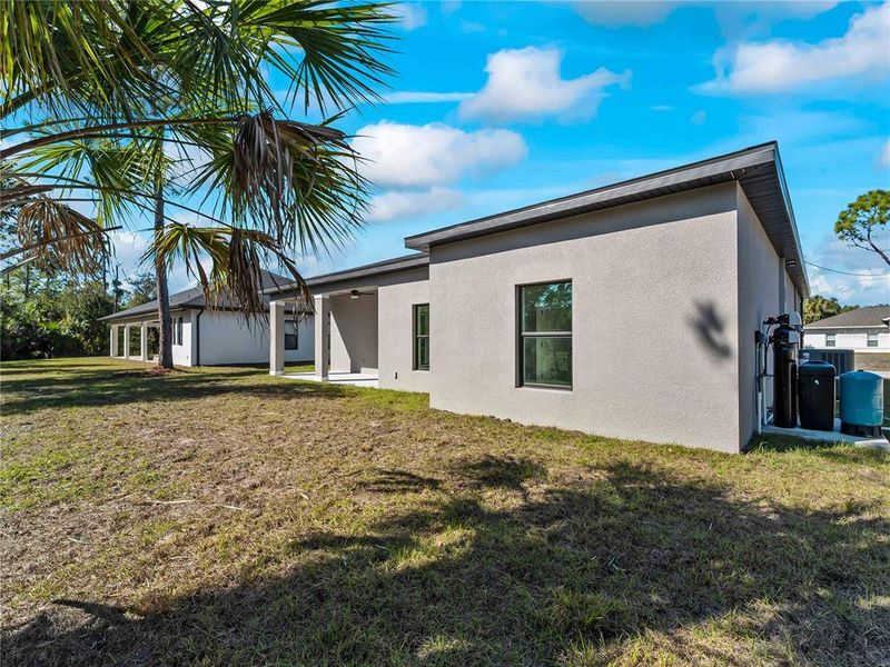 Exterior details and patio area of a home in , North Port (Image 30).