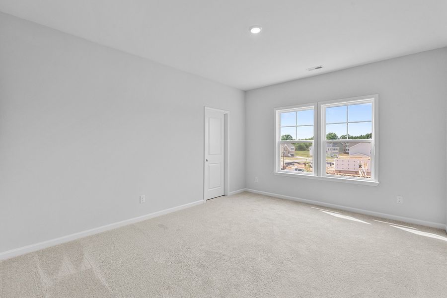 Spacious, unfurnished interior of a new home in Lilah Grove, Summerfield (Image 38).