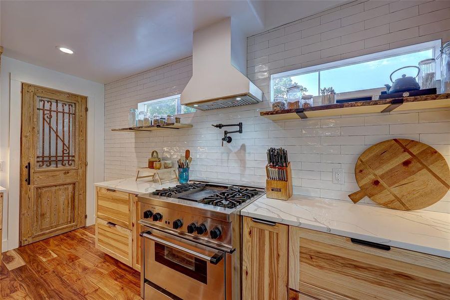 Thermador gas range, imported accent door, custom cabinetry and so much more!94 San Saba St., AustinTX 78702 MLS# 7207900