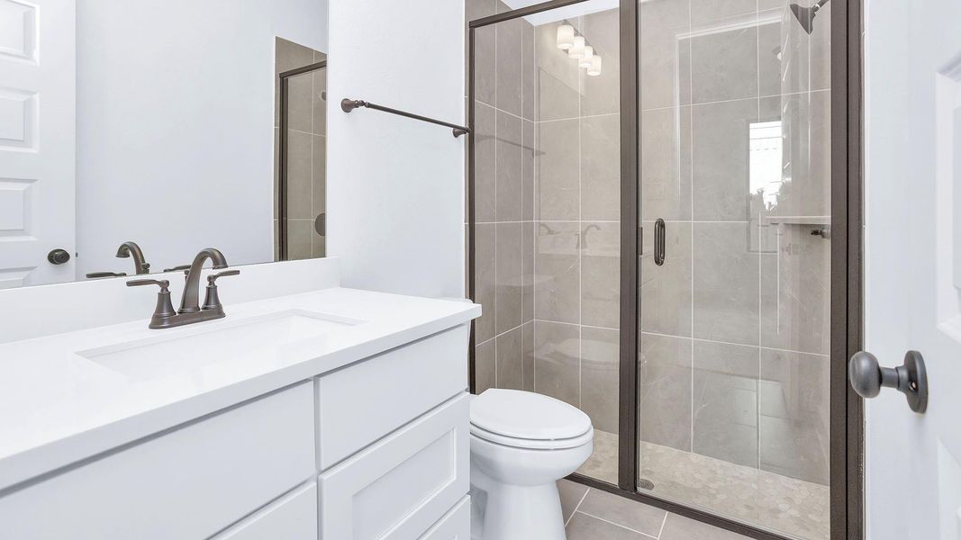 Furnished interior view inside a new home in Bridgeland, Cypress (Image 6).