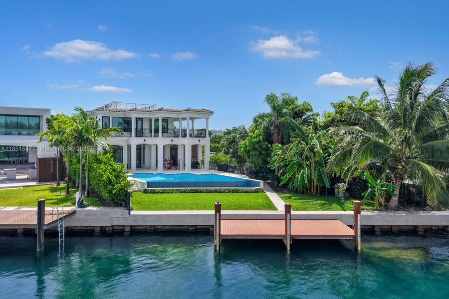 Front exterior of a new home in , Surfside, FL, highlighting curb appeal (Image 19).