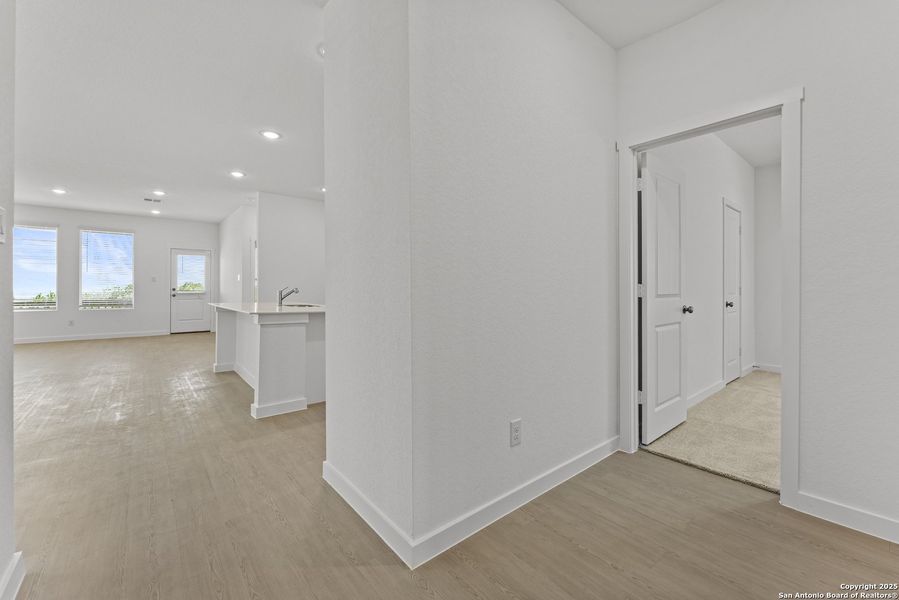 Spacious, unfurnished interior of a new home in Waterwheel: Coastline Collection, San Antonio (Image 22).