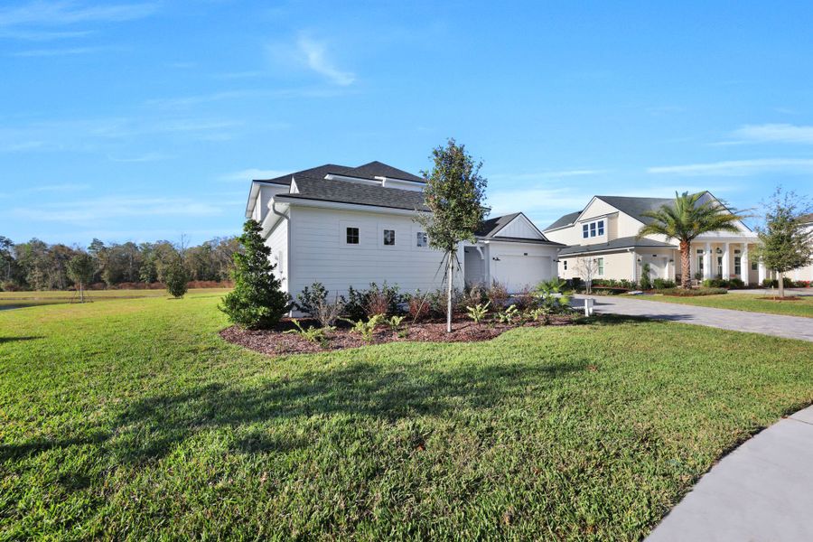 Representative exterior photo of a completed home built from the Seaside by Riverside Homes in Hidden Creek at SilverLeaf, St. Augustine, FL (Image 33). Representative exterior photo of a completed home built from the Seaside by Riverside Homes in Hidden Creek at SilverLeaf, St. Augustine, FL (Image 33).