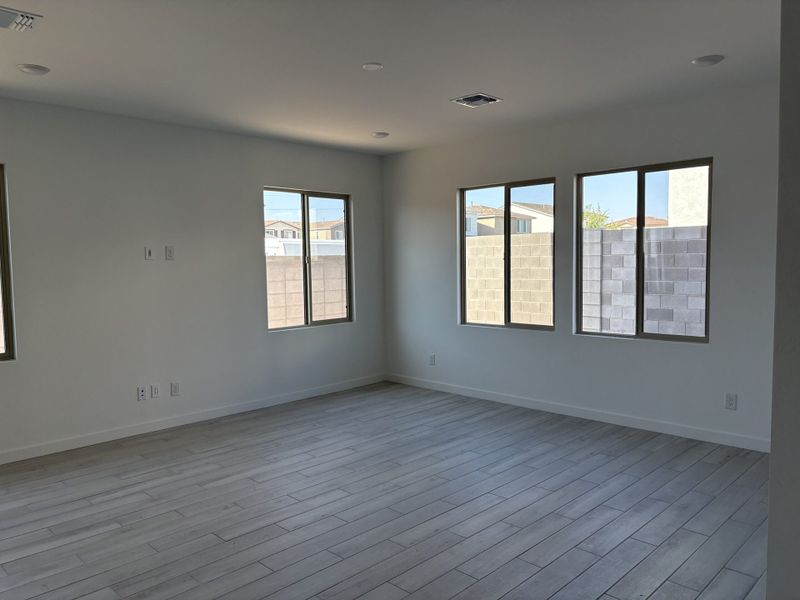 Representative unfurnished interior of a home built from the Tangelo by Risewell Homes in Mandarin at Citrus Park, Goodyear (Image 5).