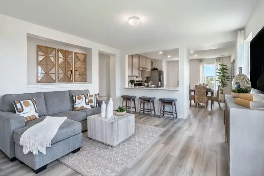Representative furnished interior of a home built from the 1243 by KB Home in Espino, San Antonio (Image 4).