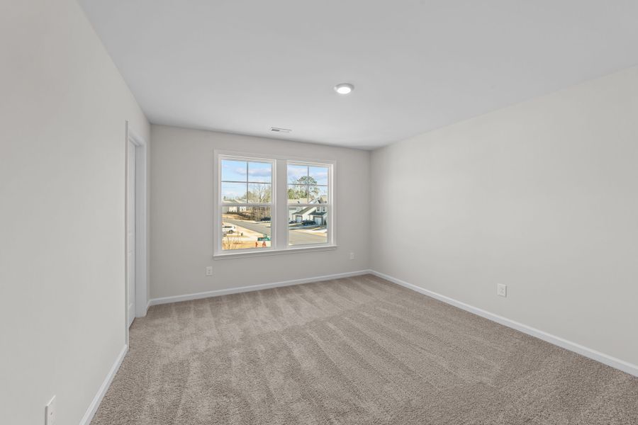 Spacious, unfurnished interior of a new home in Neill's Pointe, Angier (Image 34).